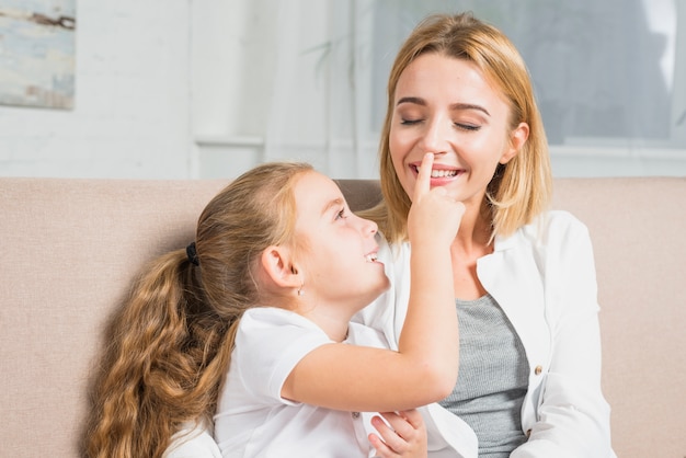 Mother and daughter playing 