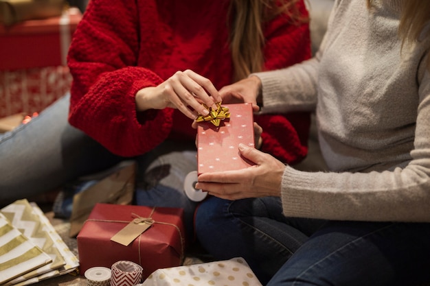 Mother and daughter preparing gifts