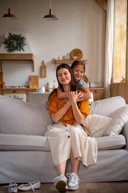 Mother and daughter spending time together while wearing linen clothing