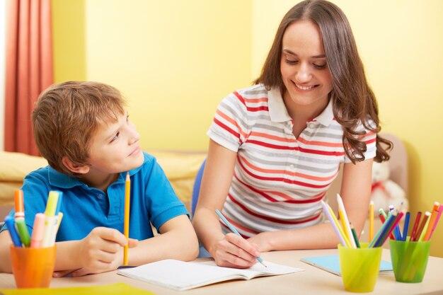 Mother drawing with her son