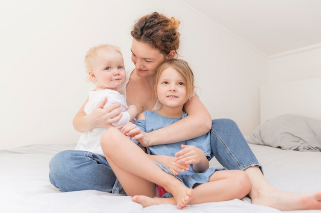 Mother enjoying time with kids at home