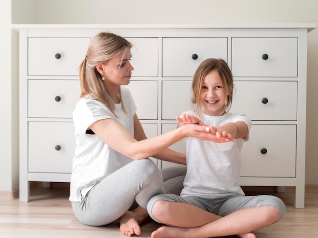 Mother and girl sport practice