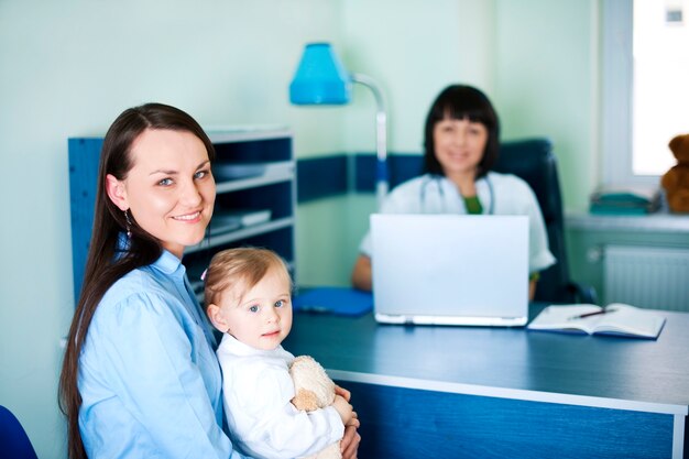 Mother and her daughter at the pediatrician