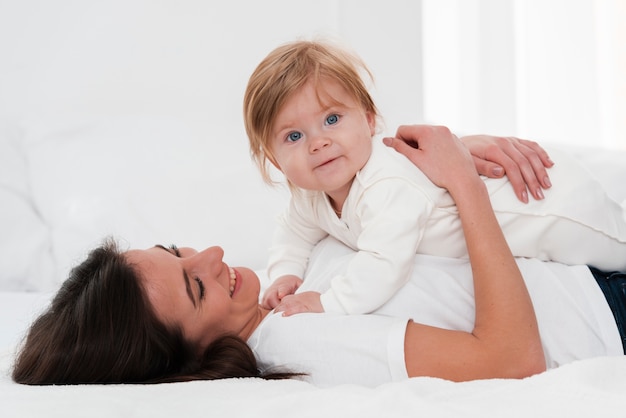 Mother holding beautiful baby