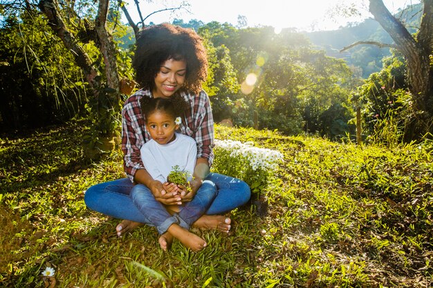 Mother holding daughter