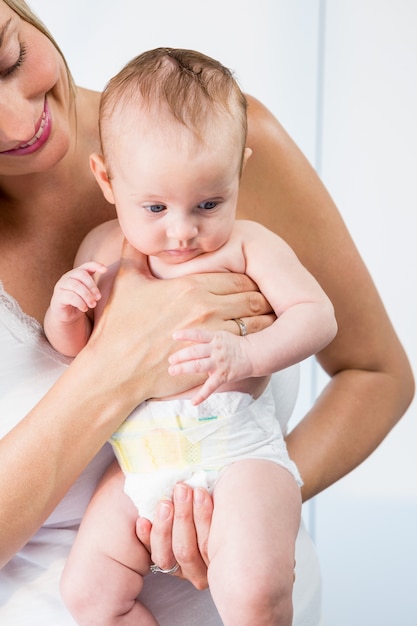 Mother holding her baby boy