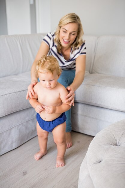 Mother holding her baby boy