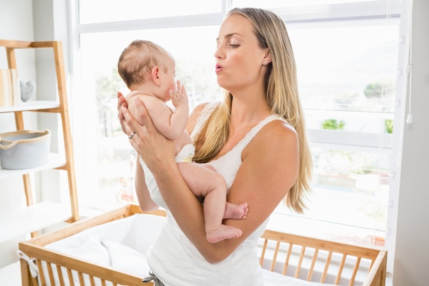 Mother holding her baby boy