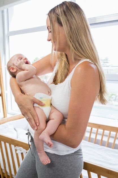 Mother holding her baby boy