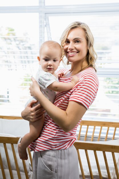 Mother holding her baby boy