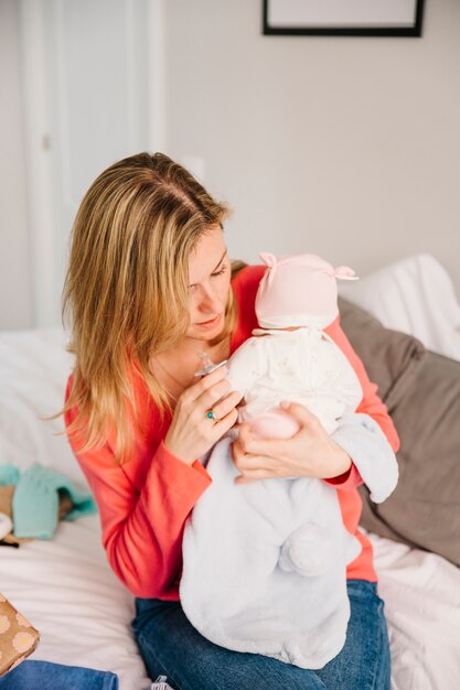 Mother holding her baby on mothers day