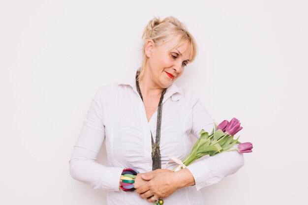 Mother looking at flowers