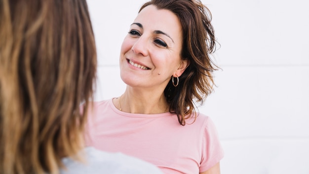 mother looking at woman