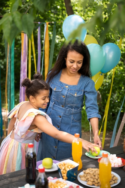 Mother organising jungle theme party