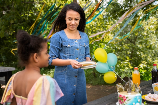 Mother organising jungle theme party