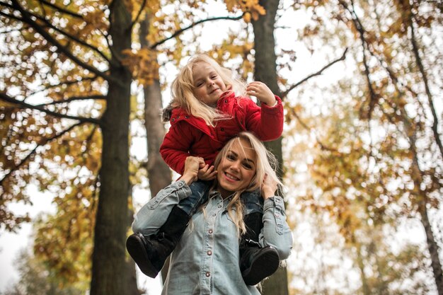 Mother playing with her adorable daughter