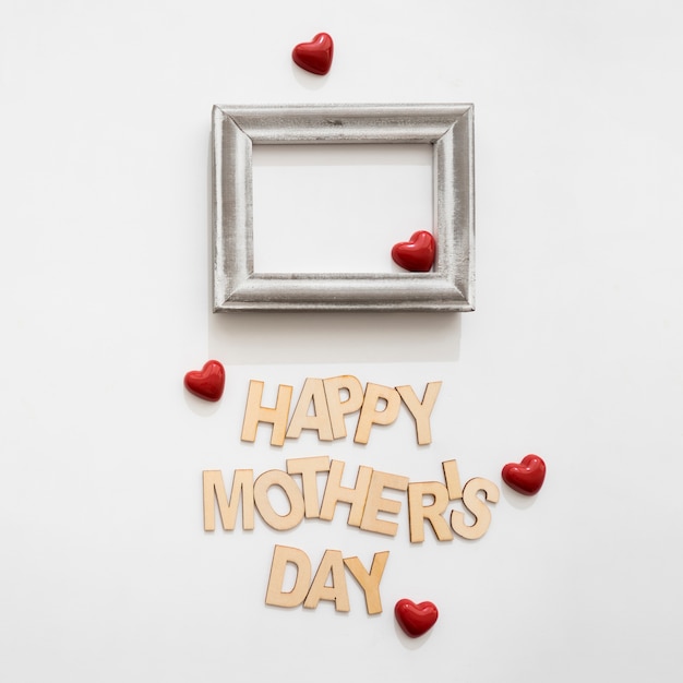 Mother's day lettering with small red hearts
