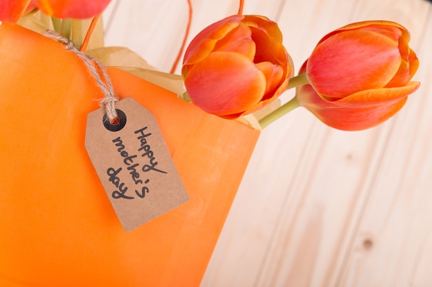 Free photo mother's day tag and yellow bag