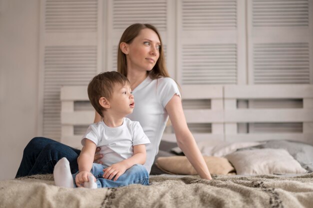 Mother and son in bed