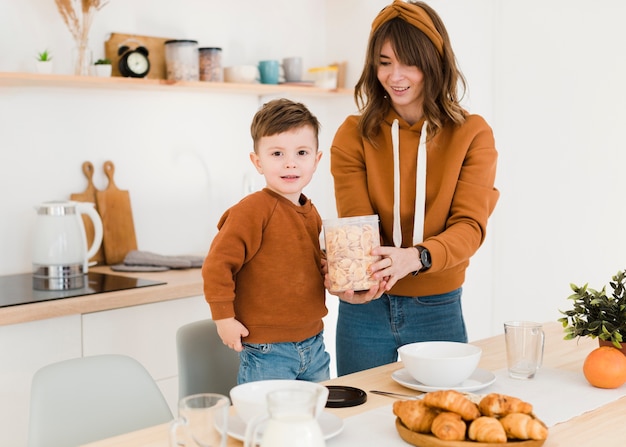 Mother and son in kitchen