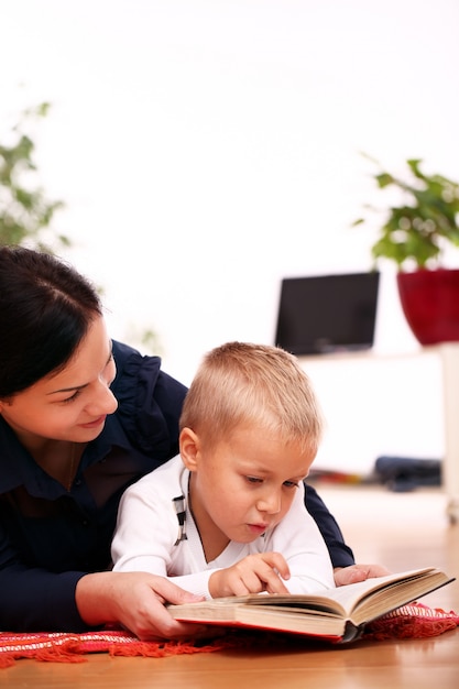 mother and son reading together