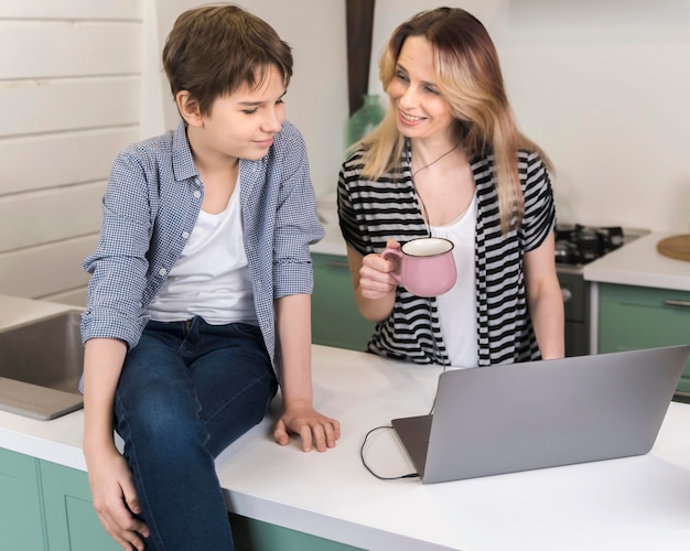 Mother and son together at home