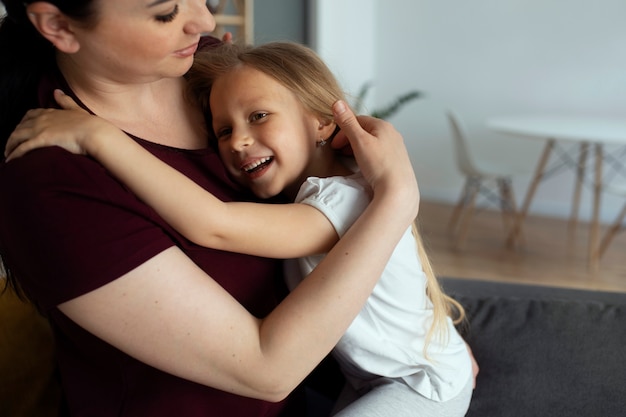 Mother taking care of child with head lices