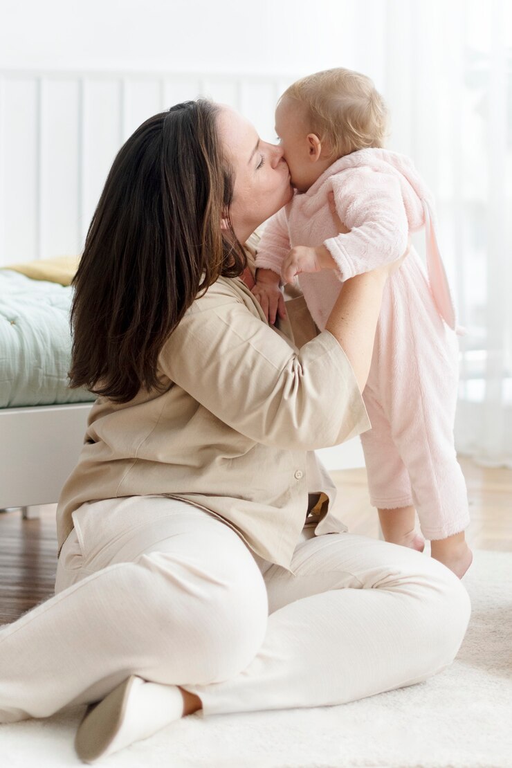 Free Photo mother and toddler playing together