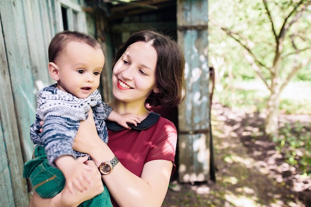 Mother with baby on hands