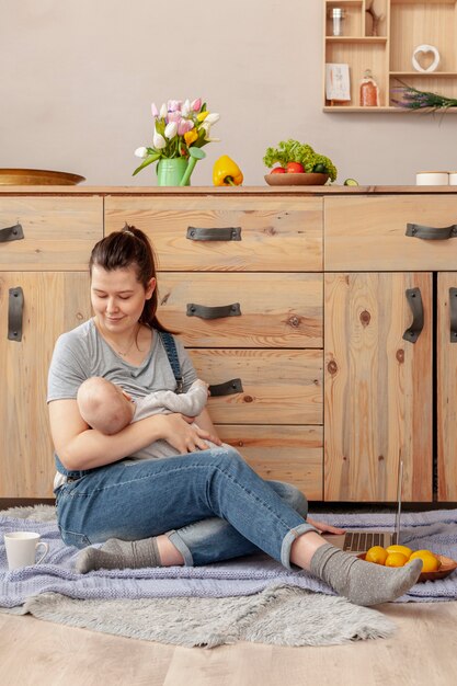 Mother with baby at home