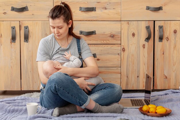 Mother with baby at home