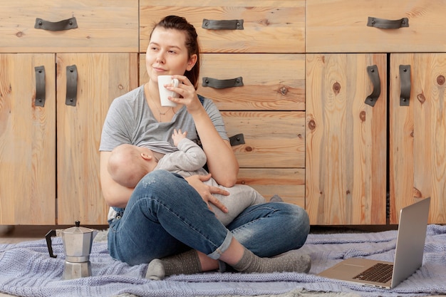 Mother with baby at home