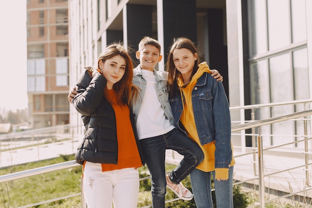 Mother with children in a spring city