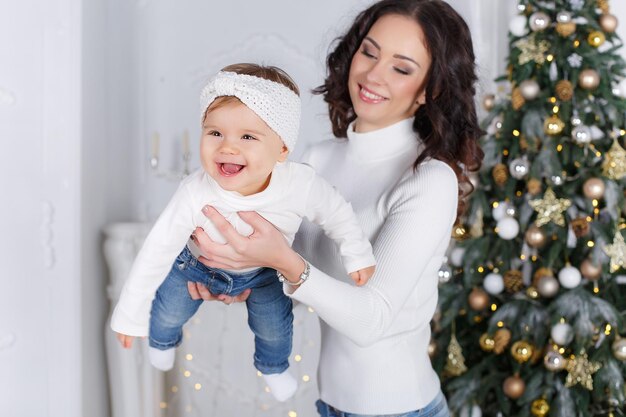 mother with cute baby indoor