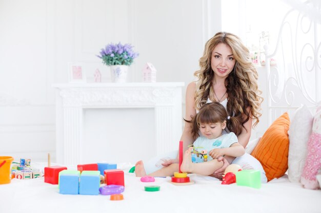 mother with cute baby indoor