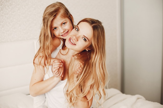 mother with cute blond daughter