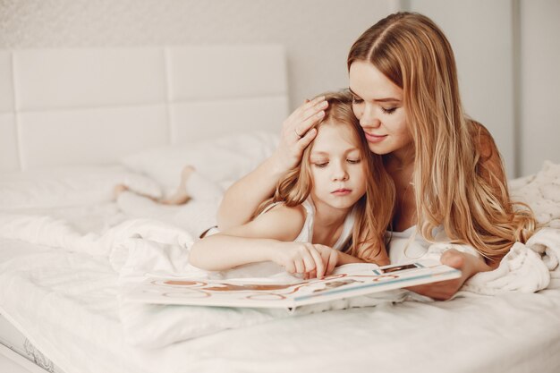 mother with cute blond daughter