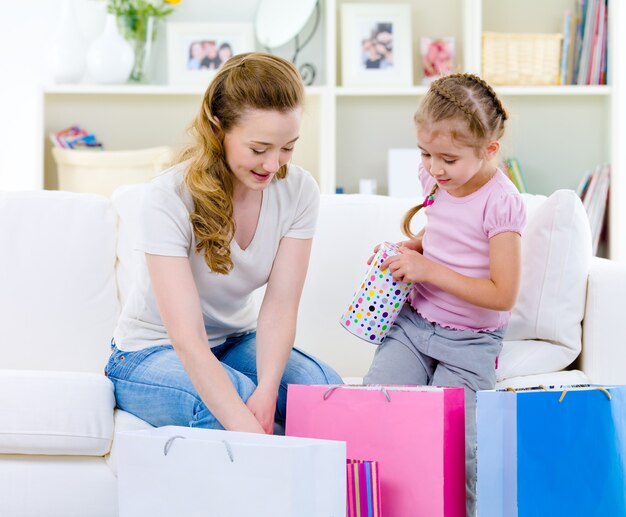 Mother with daughter after shopping