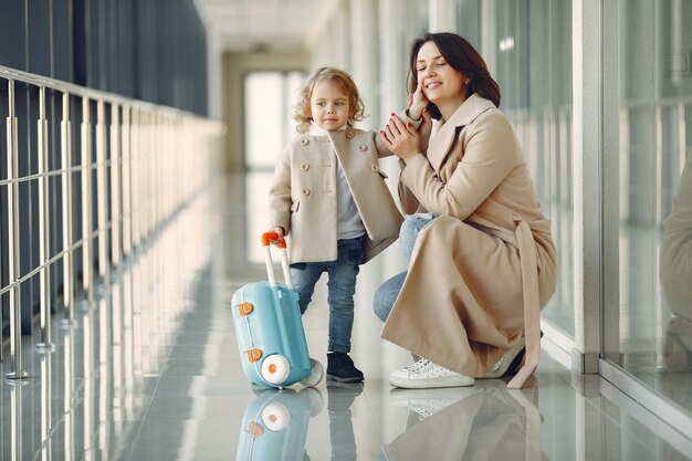 Mother with daughter at the airport