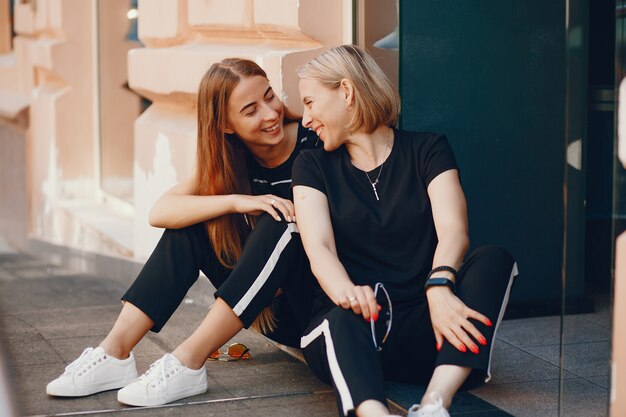 Mother with daughter in a city