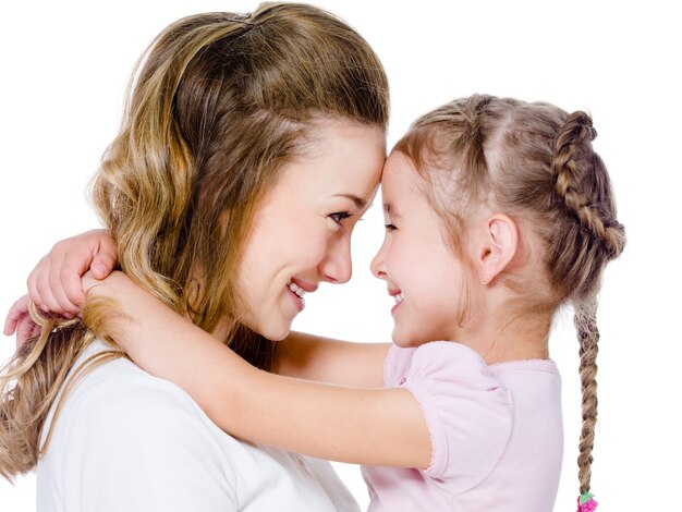 Mother with daughter in embrace