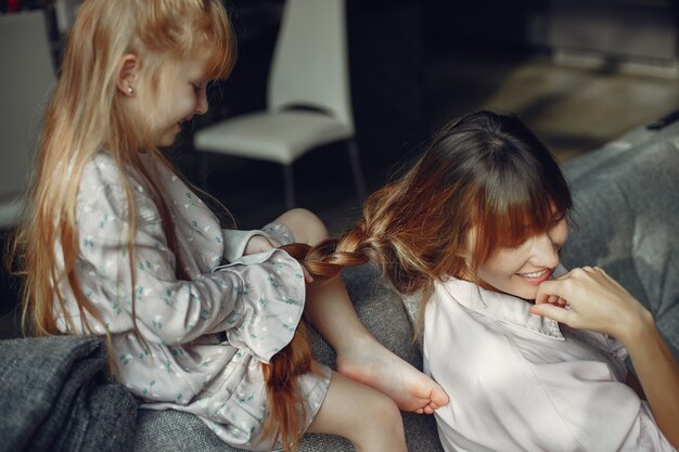 Mother with daughter at home