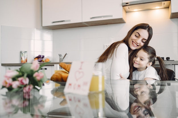 Mother with daughter at home