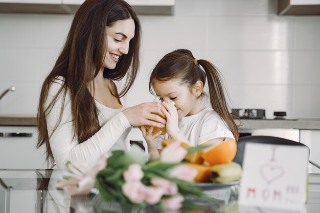 Mother with daughter at home