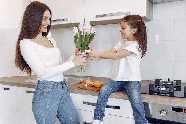 Mother with daughter at home