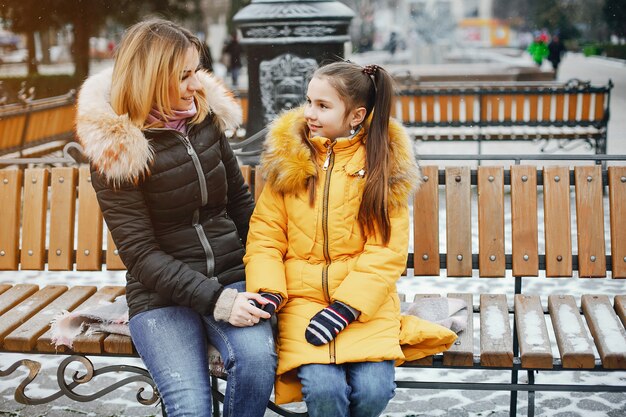 Mother with daughter in a park