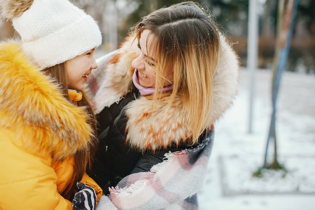 Mother with daughter in a park