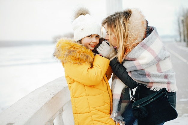 Mother with daughter in a park