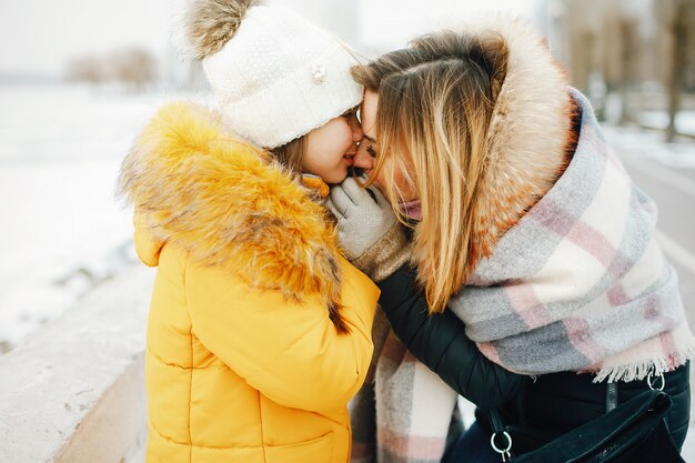 Mother with daughter in a park