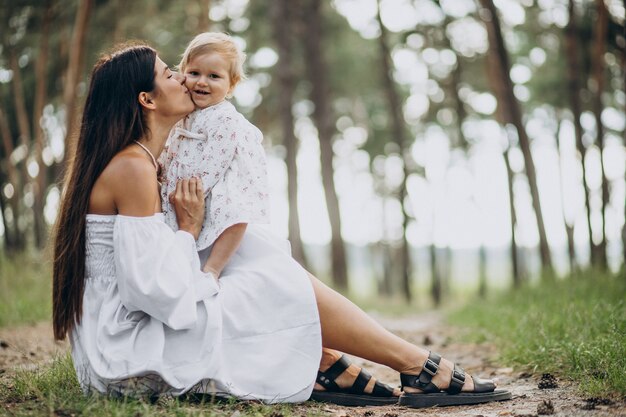 Mother with her baby girl in park